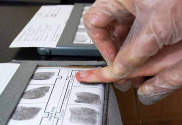 Отпечатки пальцев хотят внести в документы казахстанцев