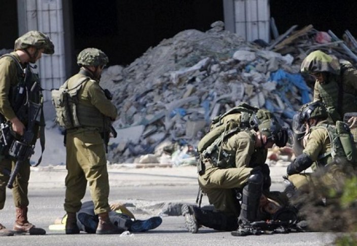 Израил әскерилеріне палестиналықтардың ту сыртынан атуға рұқсат берді