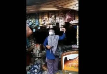 Разные: Огонь, уничтоживший рынок не тронул ларек человека занимающегося (фото)