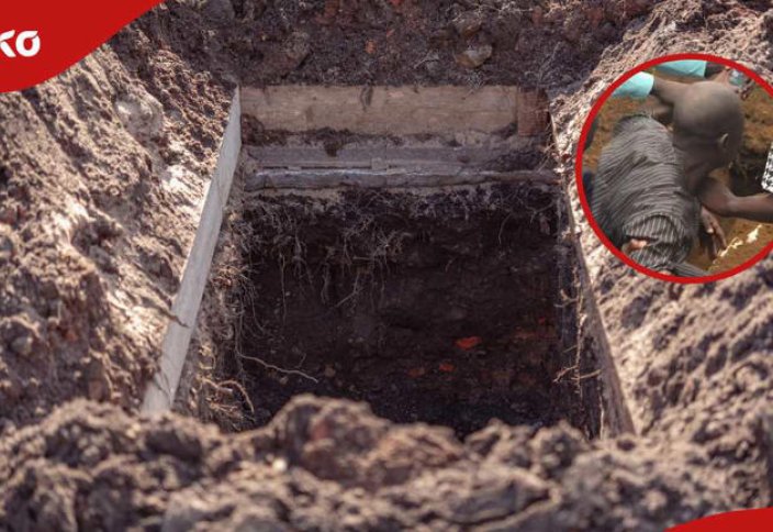 Скорбящие удерживают отца, угрожая прыгнуть в детскую могилу во время похорон